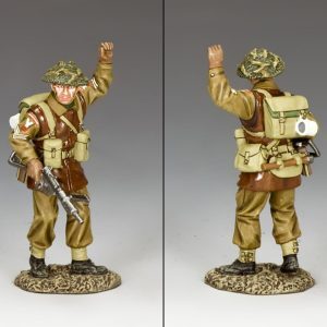 This sergeant, Sten Gun in hand, is moving ahead of the patrol and has clearly seen something as he hand-signals back to the other men to halt.