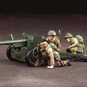 THREE PARATROOPERS MANNING A 57MM ANTI-TANK GUN