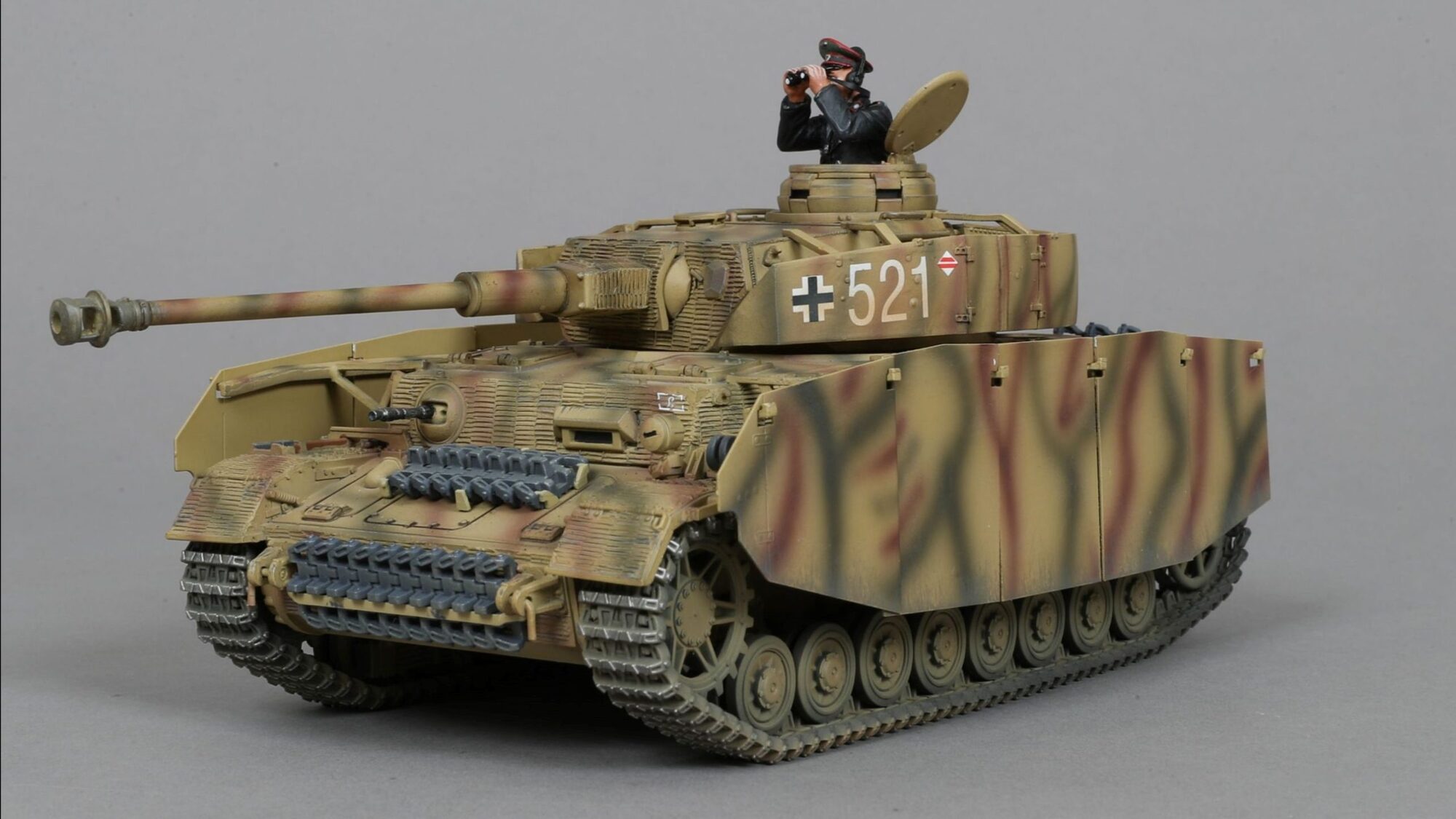 Panzer IVs with serial number 521 & Commander looking through binos.