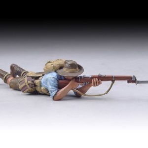 Australian Lying Down Rifleman with small backpack takes aim (blue/grey shirt)--single figure
