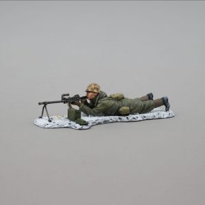 A prone MG gunner lets off a burst at the North Koreans