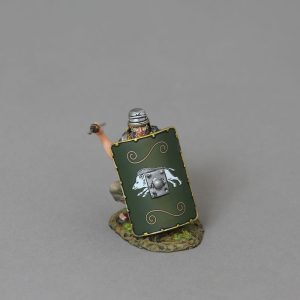 Legionnaire crouching behind shield