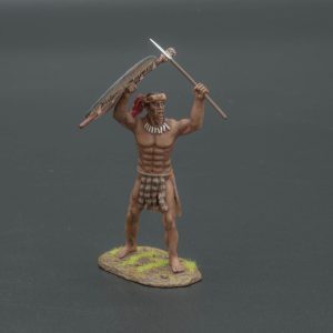 A Zulu warrior standsÿstands with Asseagi raised shouting at the British to take their best shot!