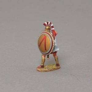 A Spartan warrior stands with sword ready to thrust as the enemy advance