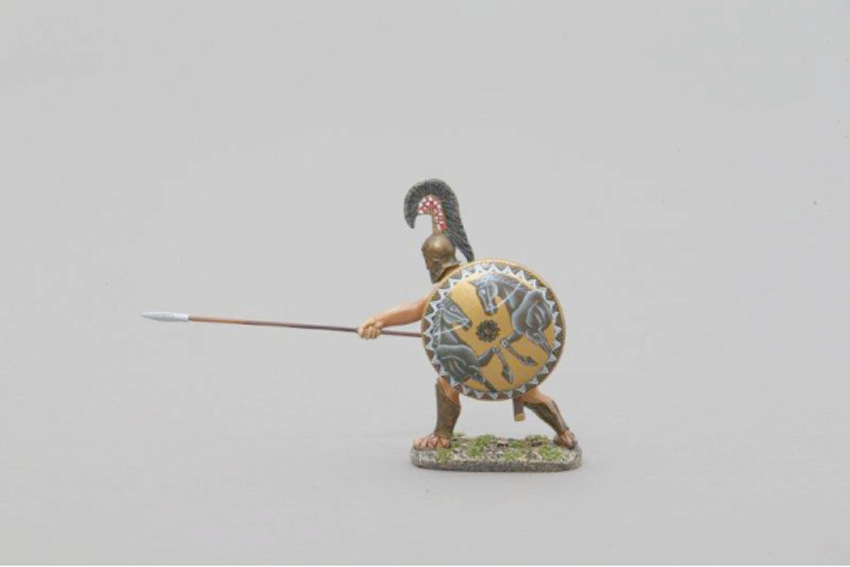 Thespian warrior wearing Corinthian helmet and thrusting spear with 2 horses on gold background