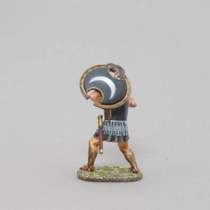 Thespian soldier with Corinthian style helmet with shield raised above head and sword drawn with half-moon design on shield