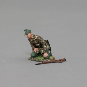 Kneeling gunner peers round the shield of his artillery piece