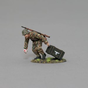 An SS soldier hurriedly brings up ammunition for his comrades