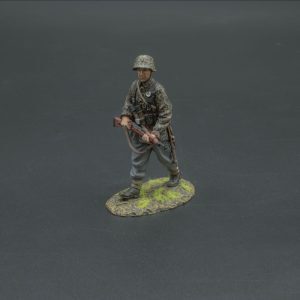 An SS Grenadier with rifle wearing helmet