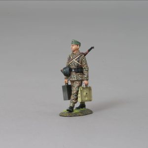 The second member of the team carries the base plate and some spare ammo