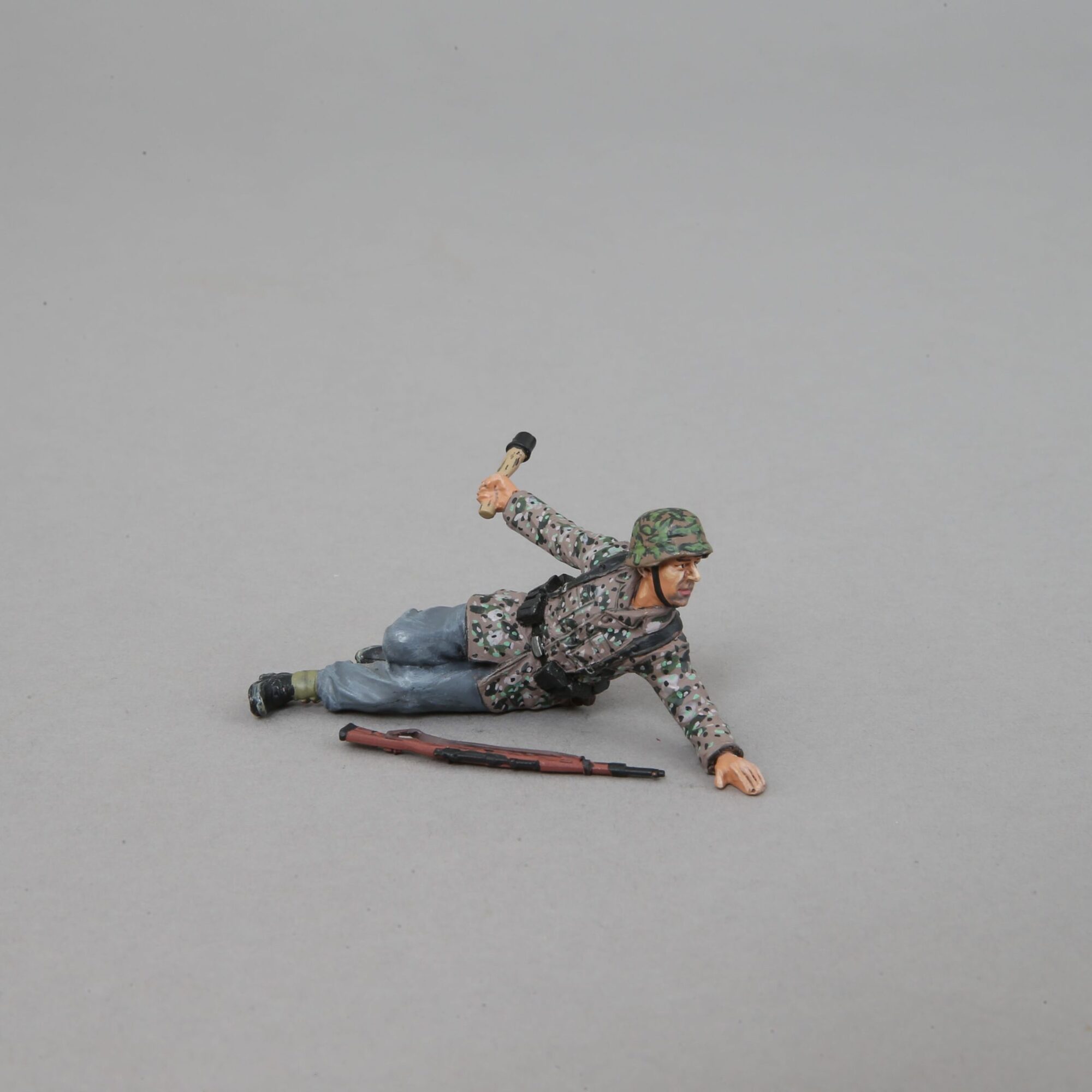 German SS Trooper - lying down, throwing a Grenade