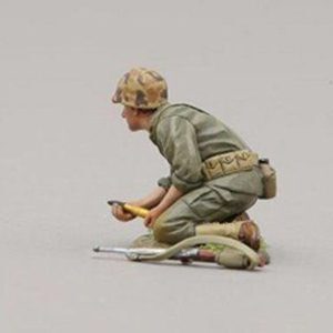 USMC soldier prepares to insert ammunition into the 37mm cannon