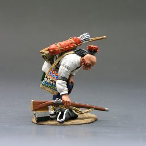 Indiano che raccoglie un fucile