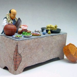 Cucina cinese con cuoco