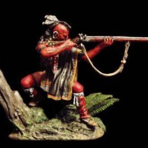 Indiano che spara con fucile