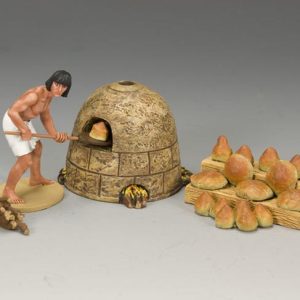 Un giovane fornaio sforna il pane